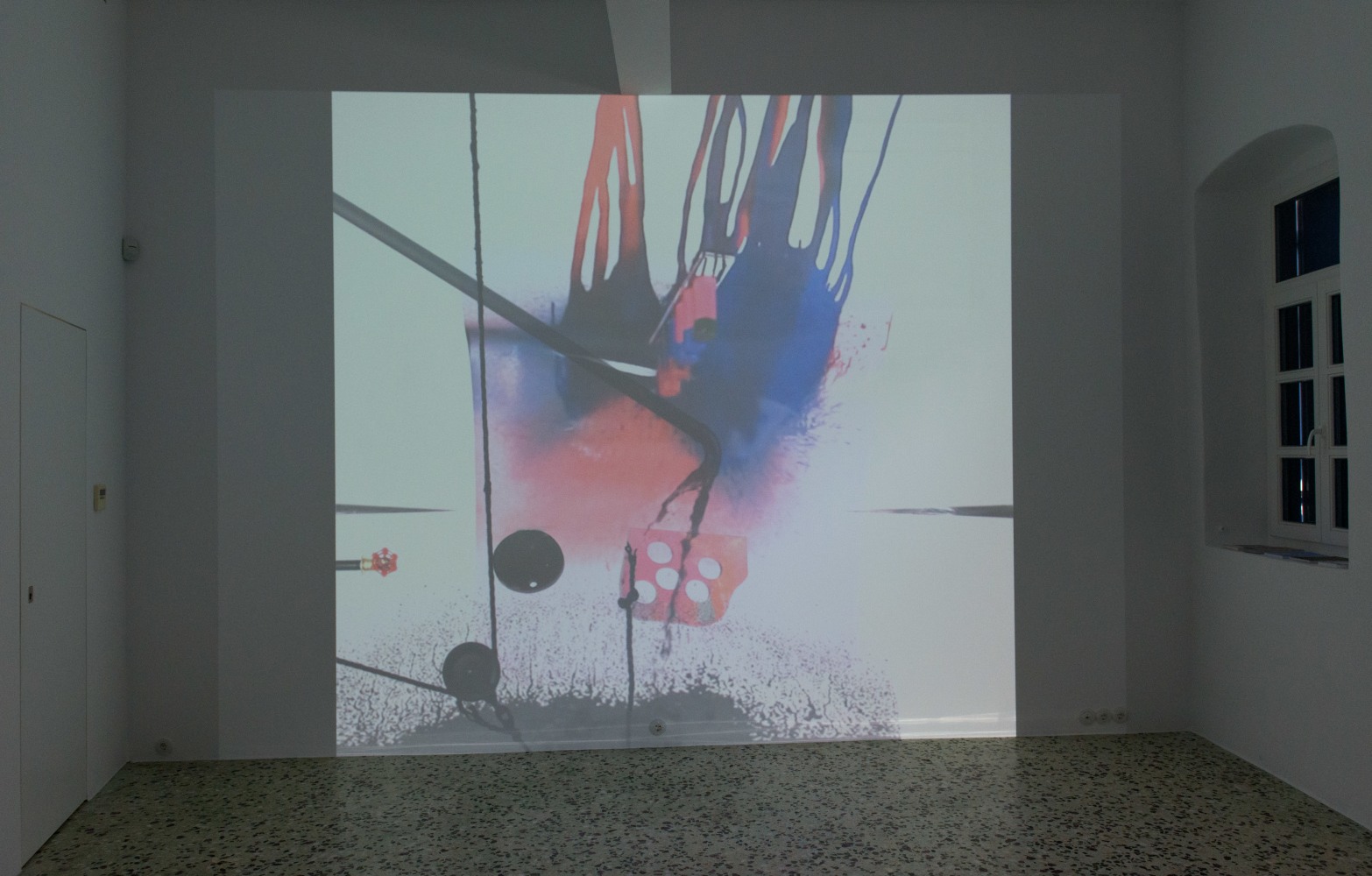 Installation view of projected film by Alex Hubbard