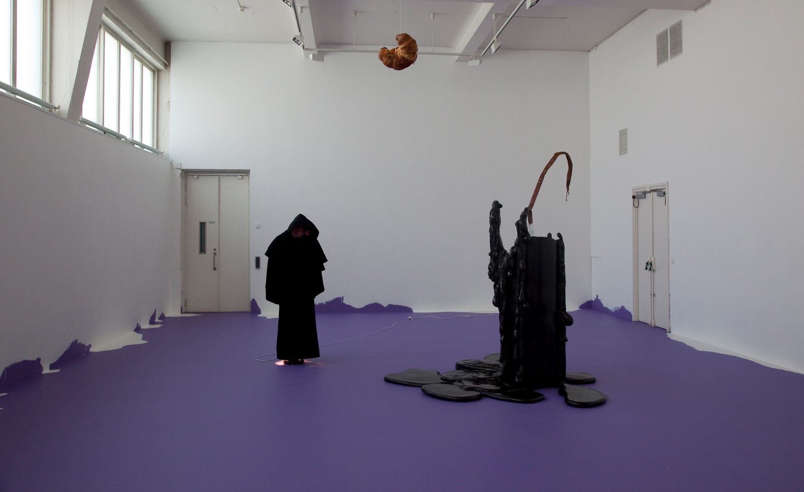 Installation view of sculptures by Urs Fischer, Mark Handforth, and Georg Herold