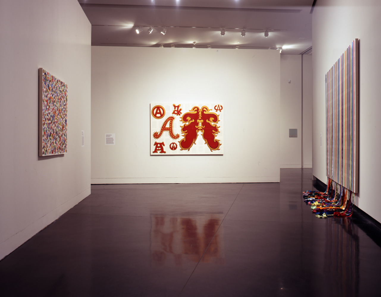 Installation view of paintings by Tim Rollins and K.O.S.