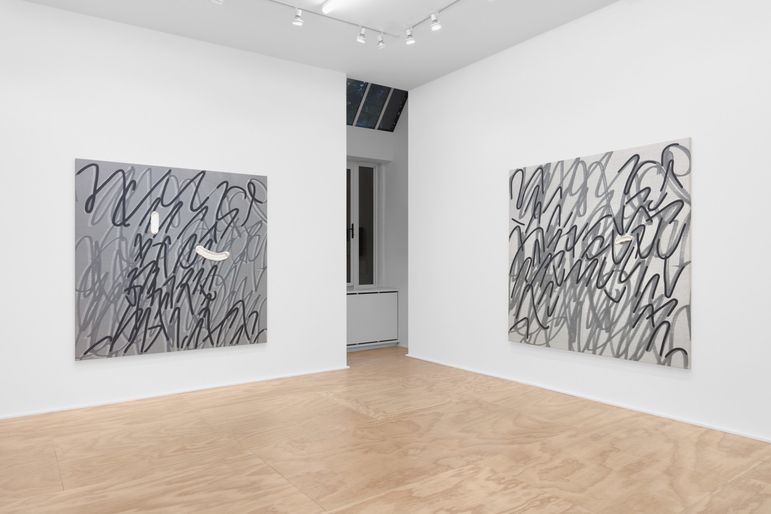 Installation view of paintings by Amy Feldman