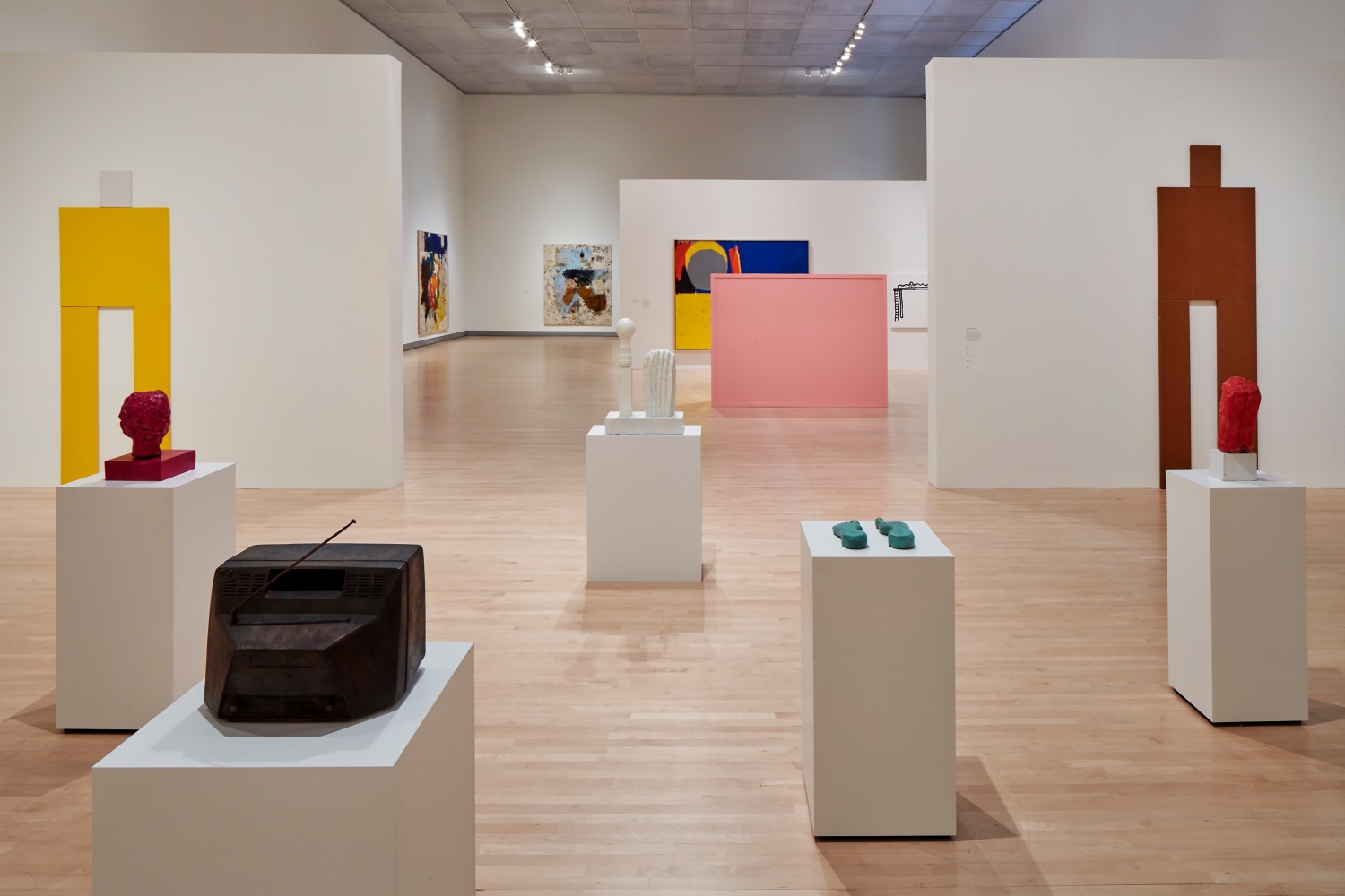 Installation view of paintings and sculptures by Joe Bradley