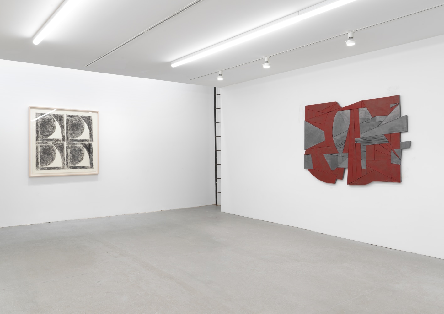 Installation view of Wyatt Kahn wall reliefs and works on paper