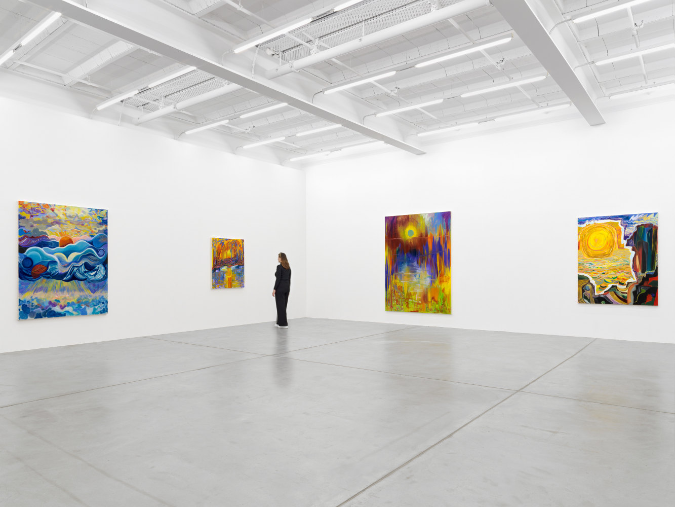 Installation view of Shara Hughes paintings