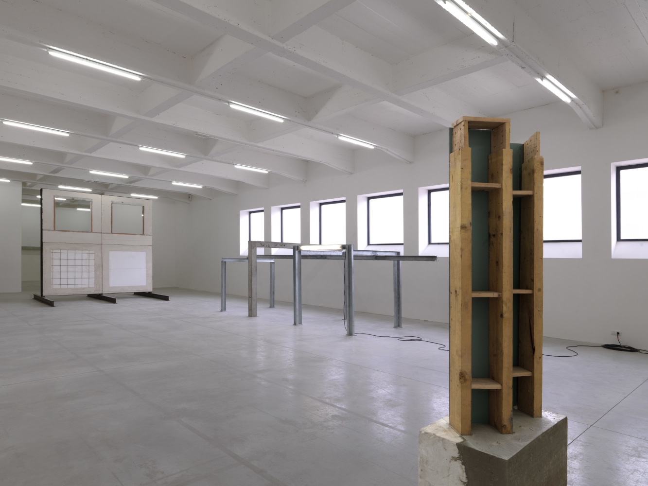 Installation view of sculptures by Oscar Tuazon