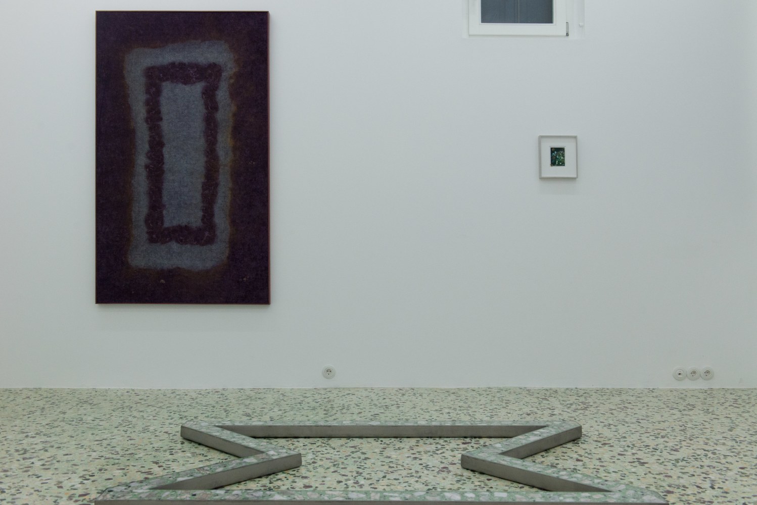 Installation view of Sam Falls paintings and sculptures exhibition