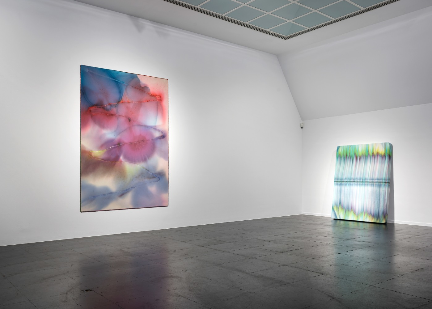 Installation view of paintings by Sam Falls
