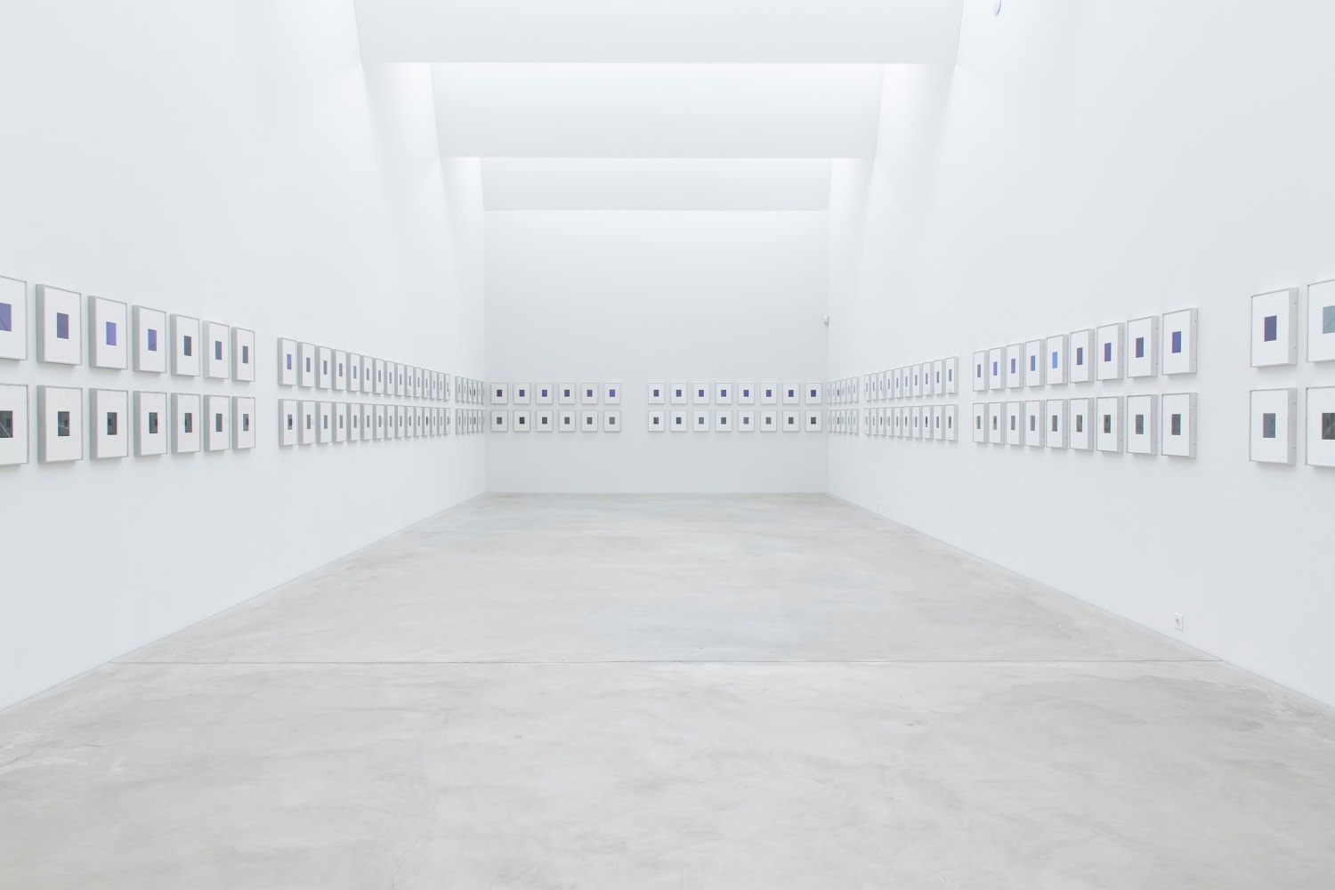 Installation view of wall works by Walead Beshty