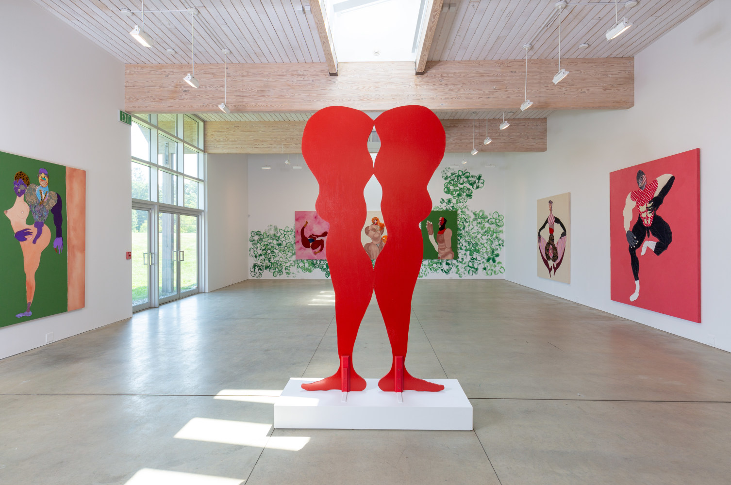 Installation view of paintings and sculptures by Tschabalala Self