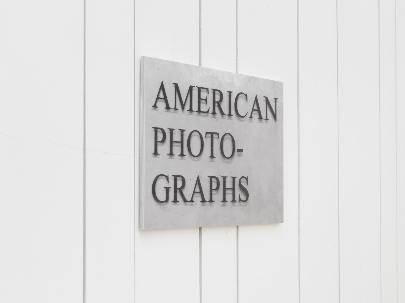 Installation view of photographs by Shannon Ebner