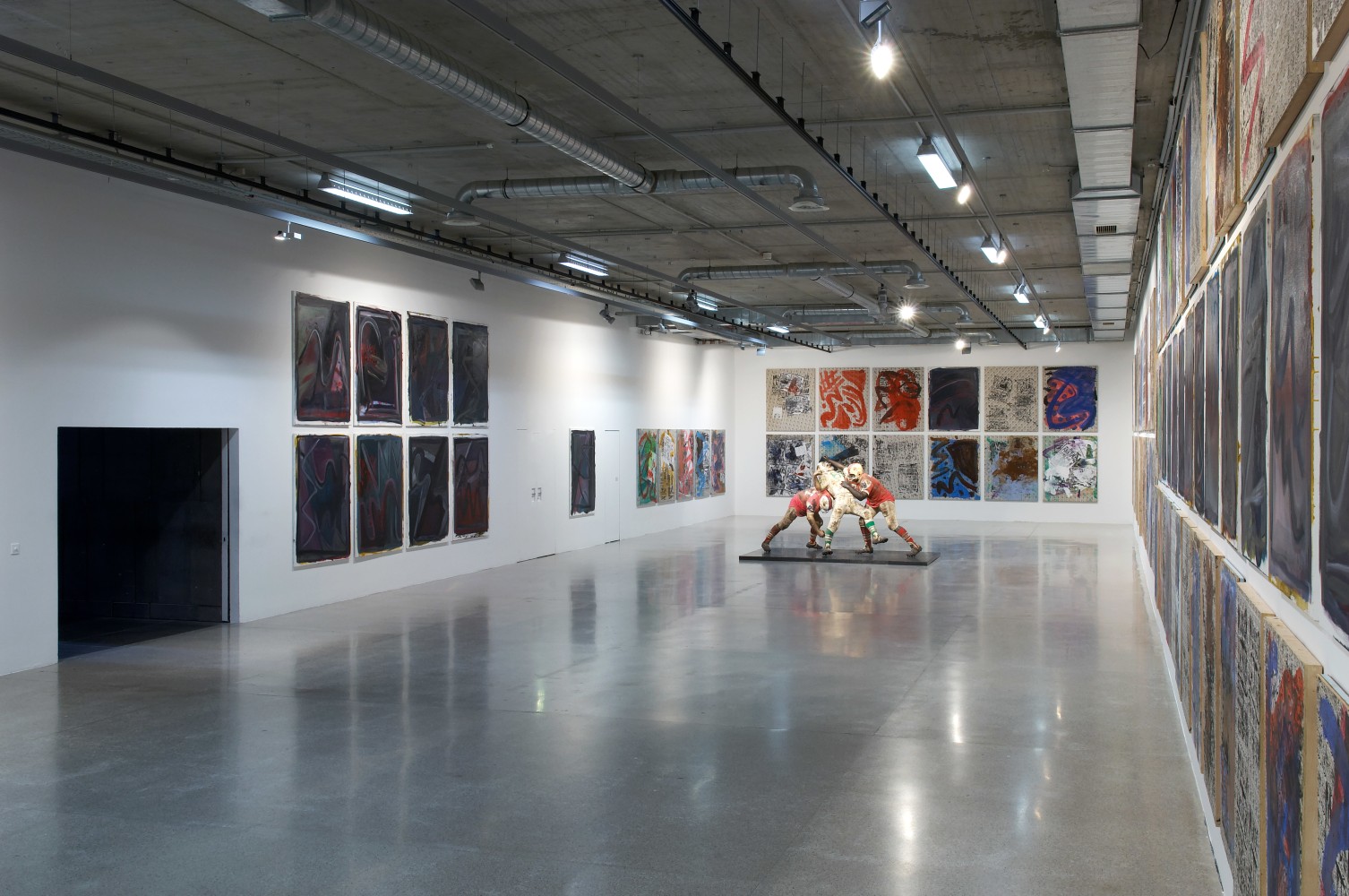 Installation view of paintings by Josh Smith