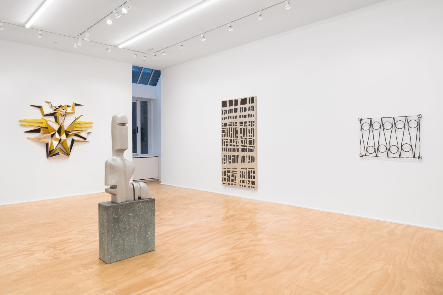 Installation view of sculptures and wall works by Valentin Carron
