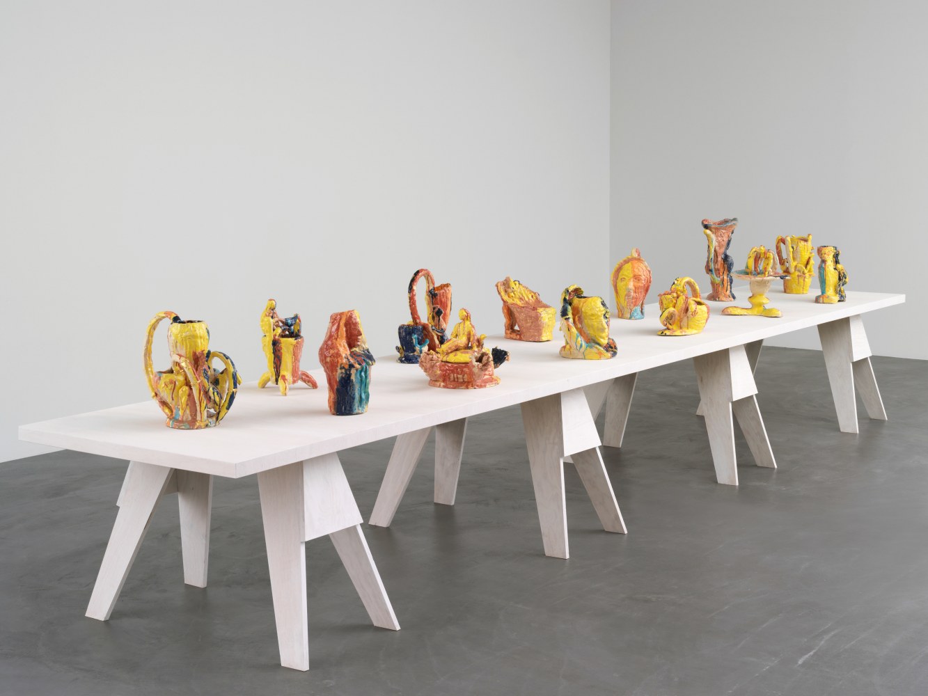 Group of sculptures by Andrew Lord on table