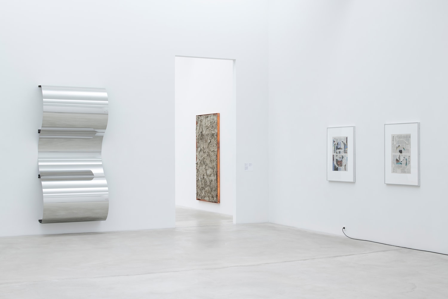 Installation view of wall works by Walead Beshty