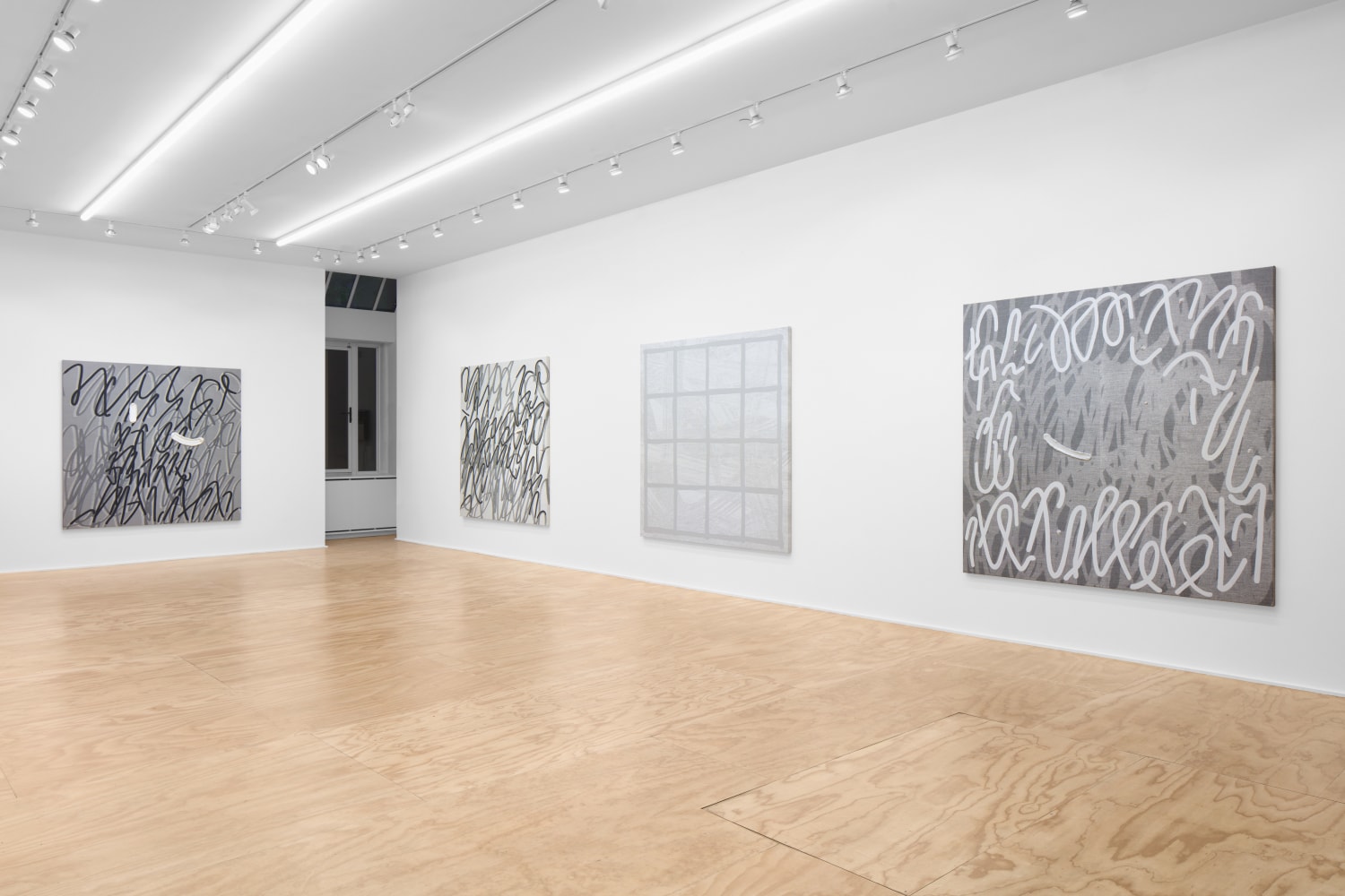 Installation view of paintings by Amy Feldman