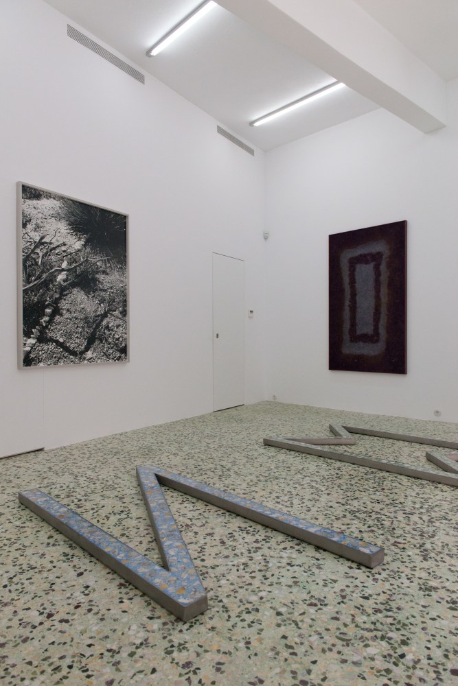 Installation view of Sam Falls paintings and sculptures exhibition