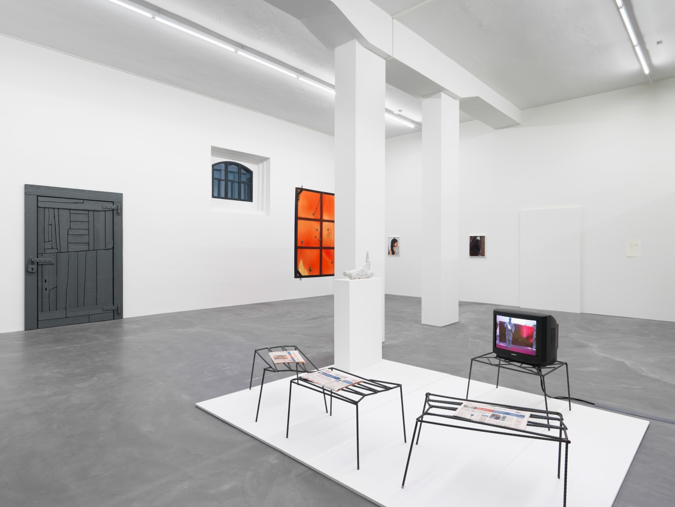 Installation view of paintings and sculptures group exhibition