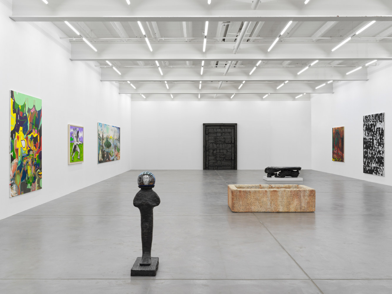 Installation view of group painting and sculpture exhibition