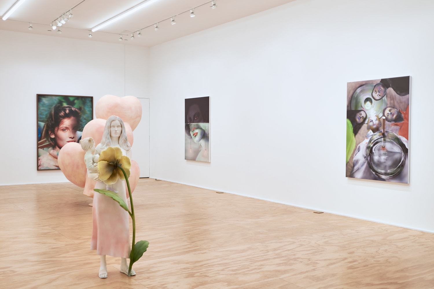 Installation views of paintings by Louisa Gagliardi and sculptures and lenticular works by Yves Scherer
