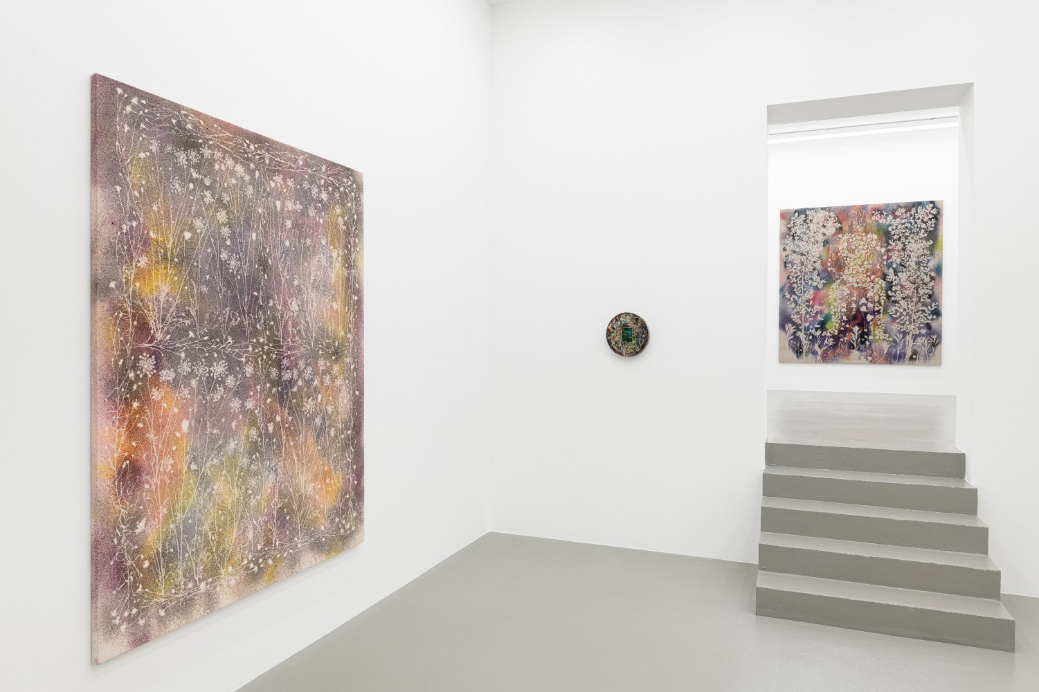 installation views of paintings and ceramic works by Sam Falls