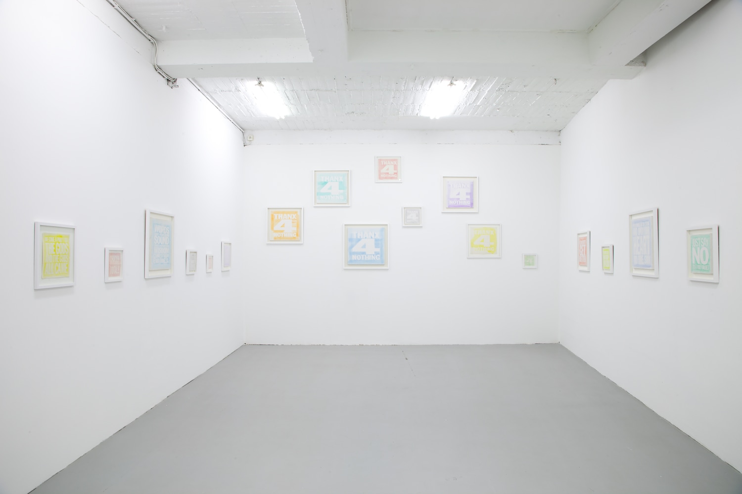 Installation view of wall works by John Giorno