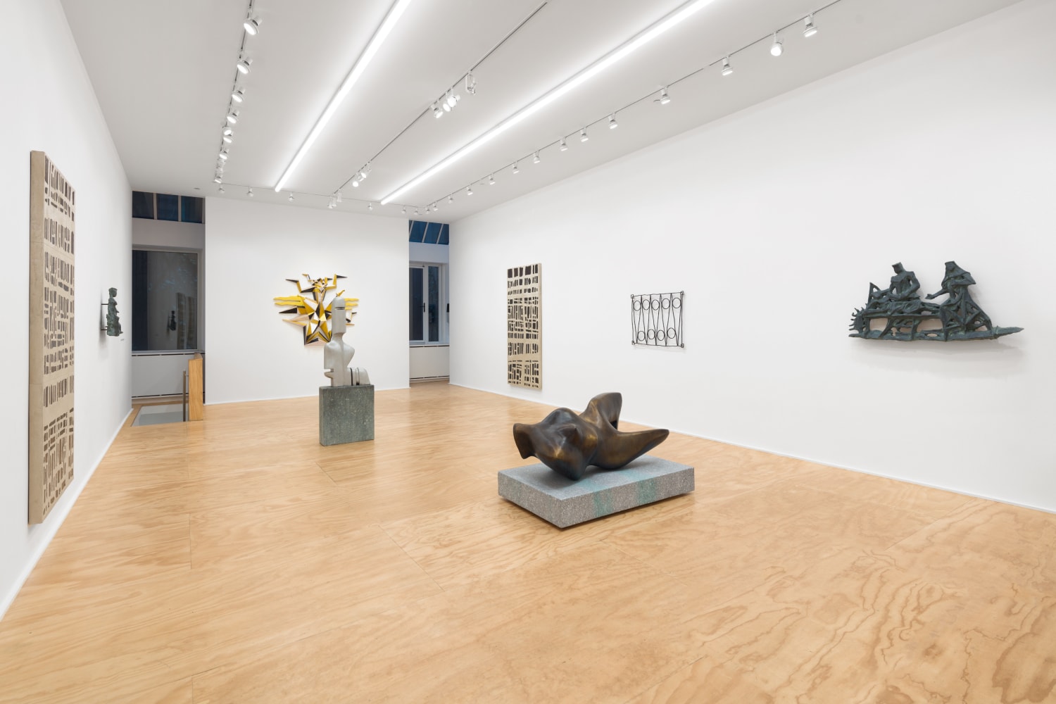 Installation view of sculptures and wall works by Valentin Carron