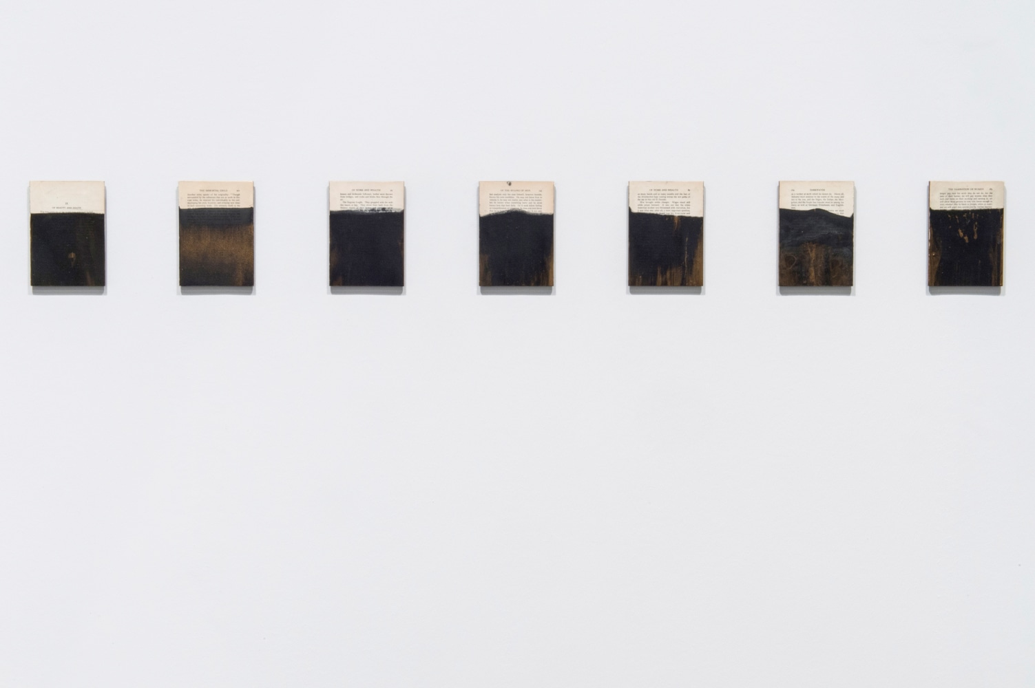 Installation view of paintings by Tim Rollins and K.O.S.