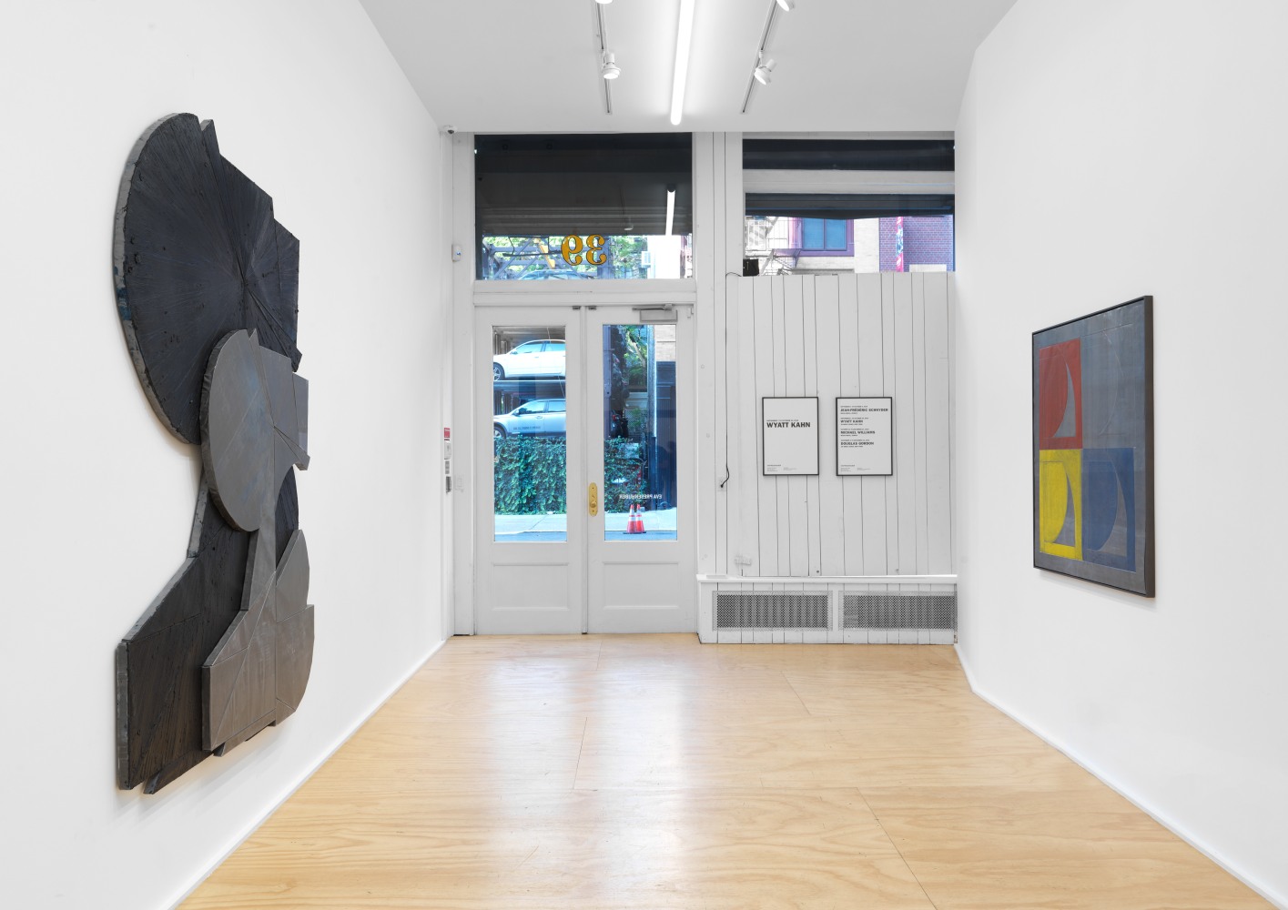 Installation view of Wyatt Kahn wall reliefs and works on paper