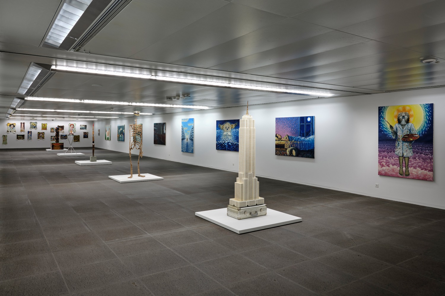 Installation view of paintings and sculptures by Jean-Frédéric Schnyder