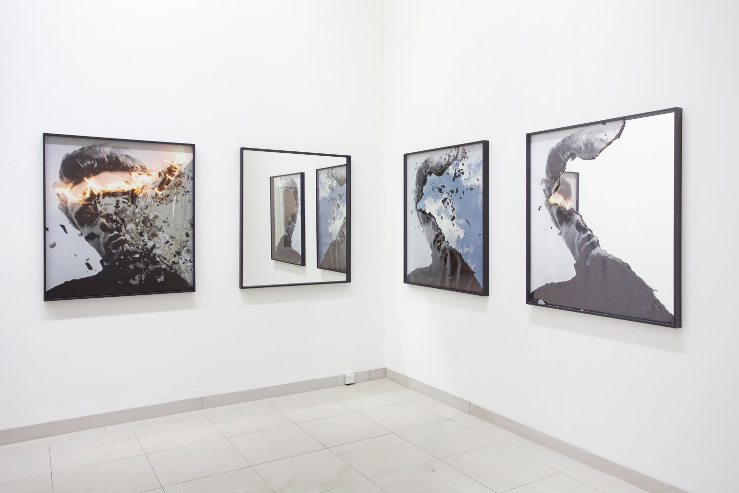 Installation view of photographs by Douglas Gordon