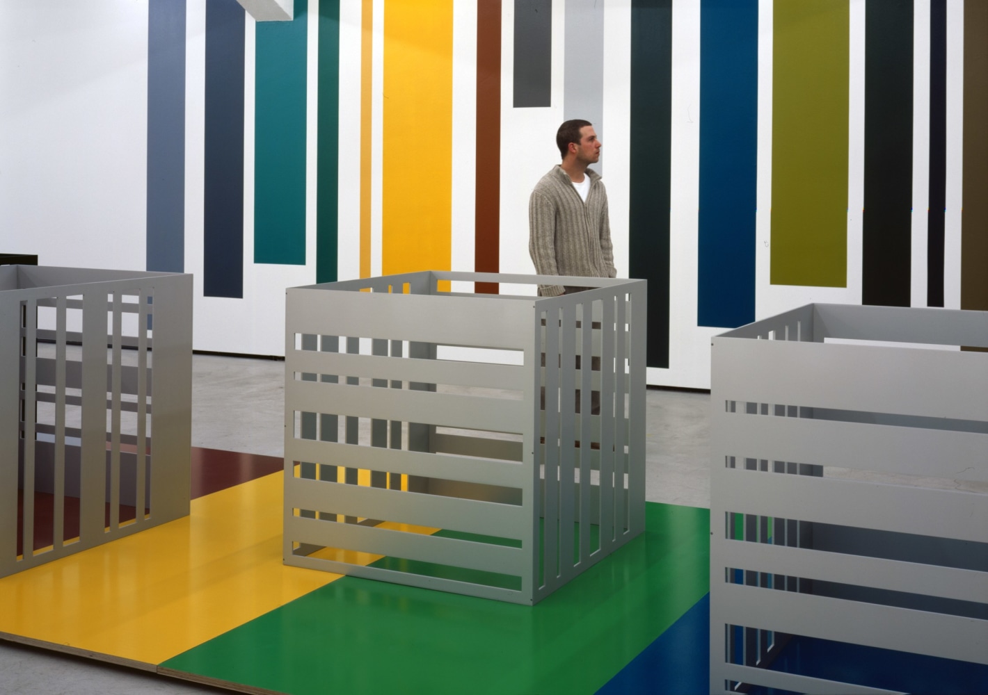 Installation view of Liam Gillick wall-based graphic work and sculpture exhibition