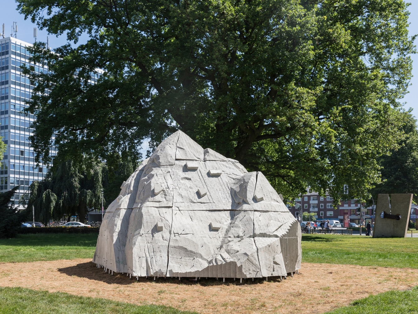 Outdoor view of Justin Matherly sculpture, Nietzsche’s Rock 2017 Concrete, fiberglass, ambulatory equipment, wood, metal 350.5 x 701 x 299.5 cm / 138 x 276 x 118 in