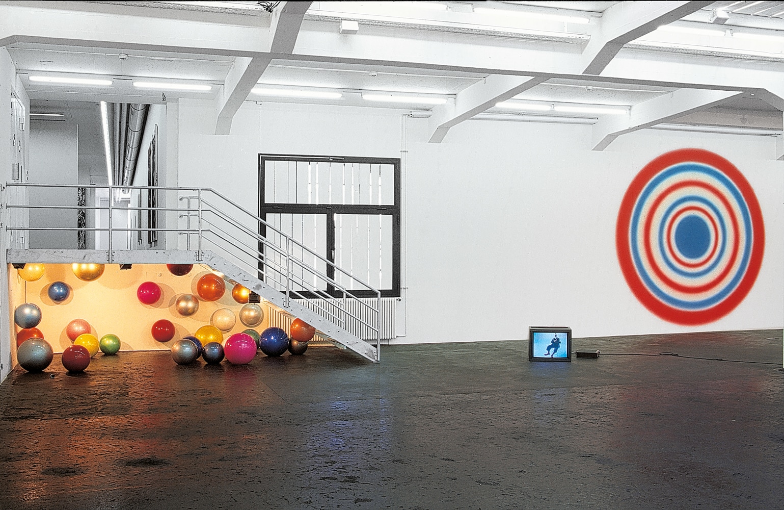 Installation view of paintings and sculptures by Ugo Rondinone