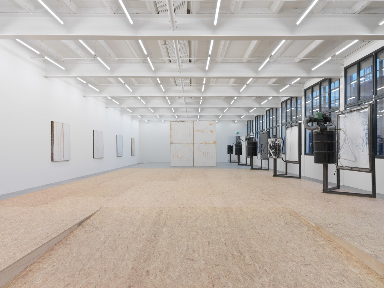 Installation view of Oscar Tuazon sculptures and floor installation exhibition