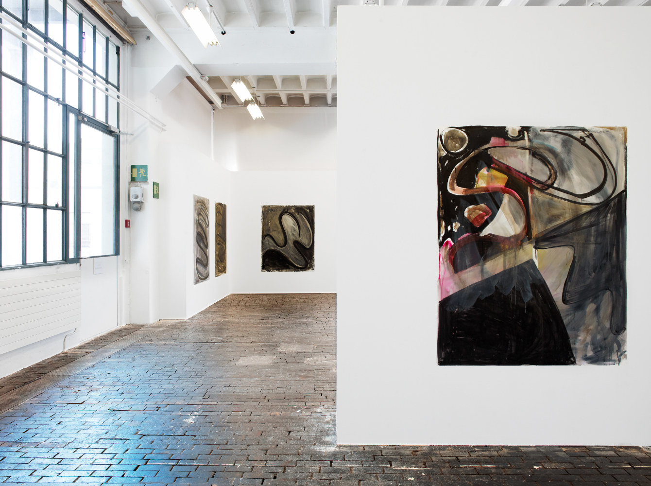 Installation view of paintings by Josh Smith
