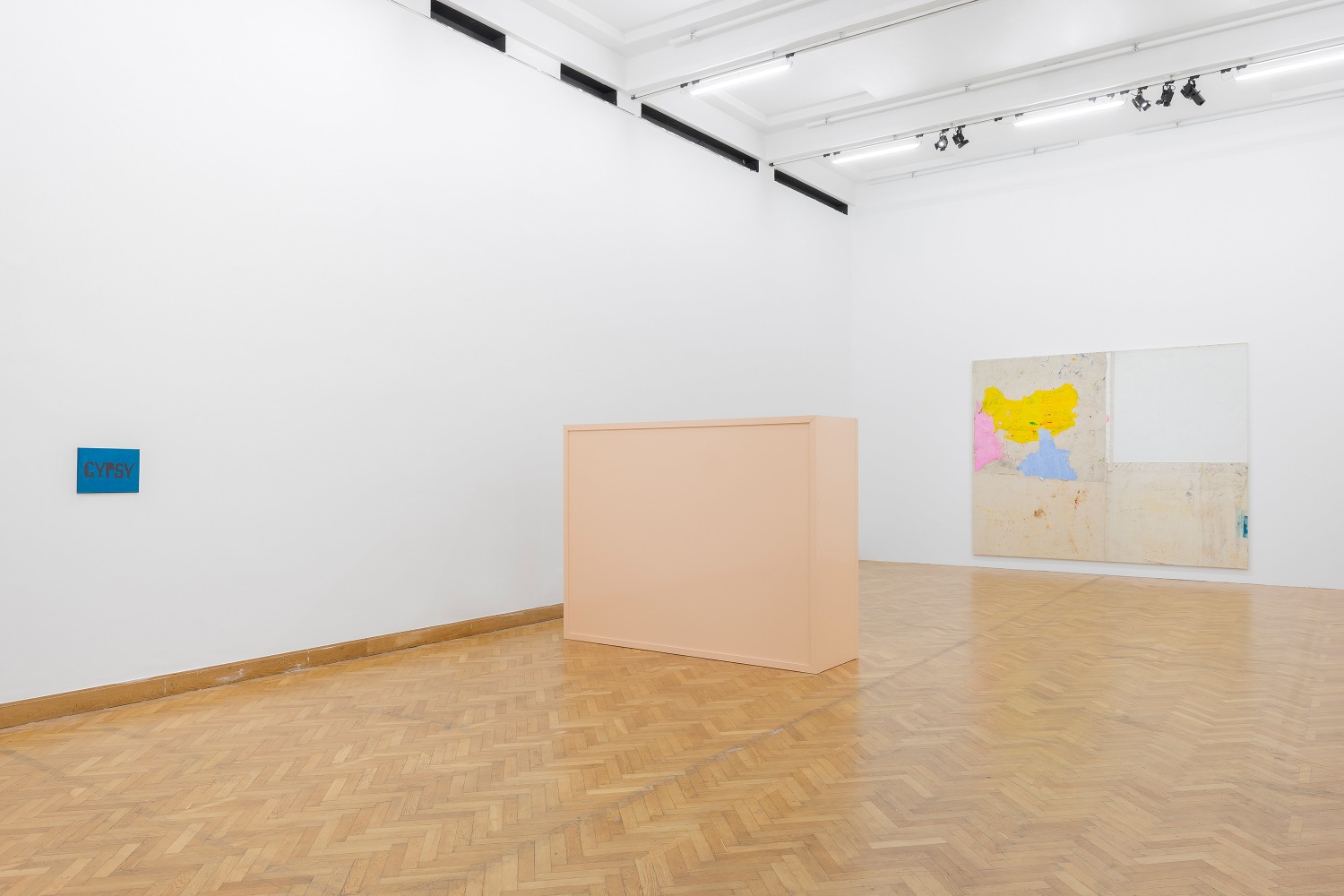 Installation view of paintings and sculptures by Joe Bradley