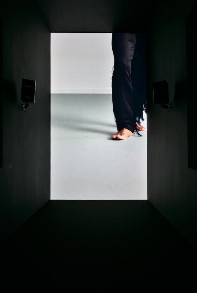 Installation view of video work by Adam Pendleton