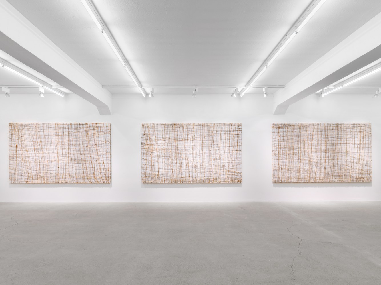 Installation view of Tim Rollins and K.O.S. paintings and text works exhibition