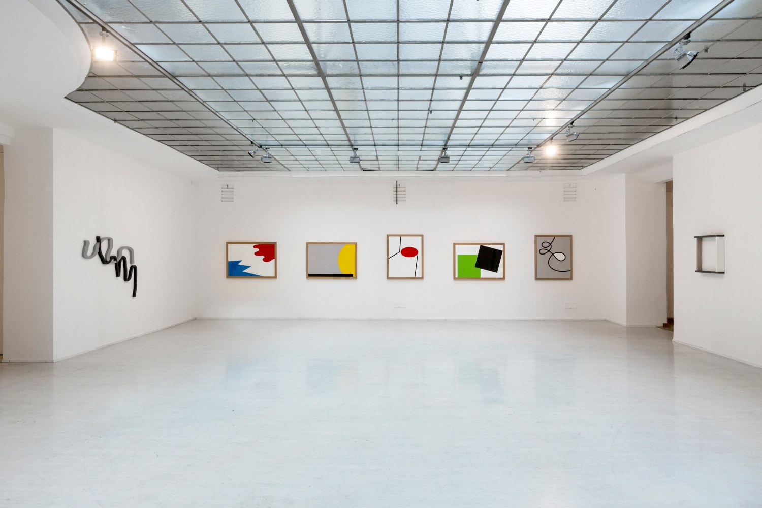 Installation by Gerwald Rockenschaub, Use it, Break it, Fix it, Try it * 2011–2014 Various objects, MDF, lacquered; 5 acrylic glass inlays, oak frame, different dimensions Installation view, Georg Kargl Fine Arts, Vienna, 2014