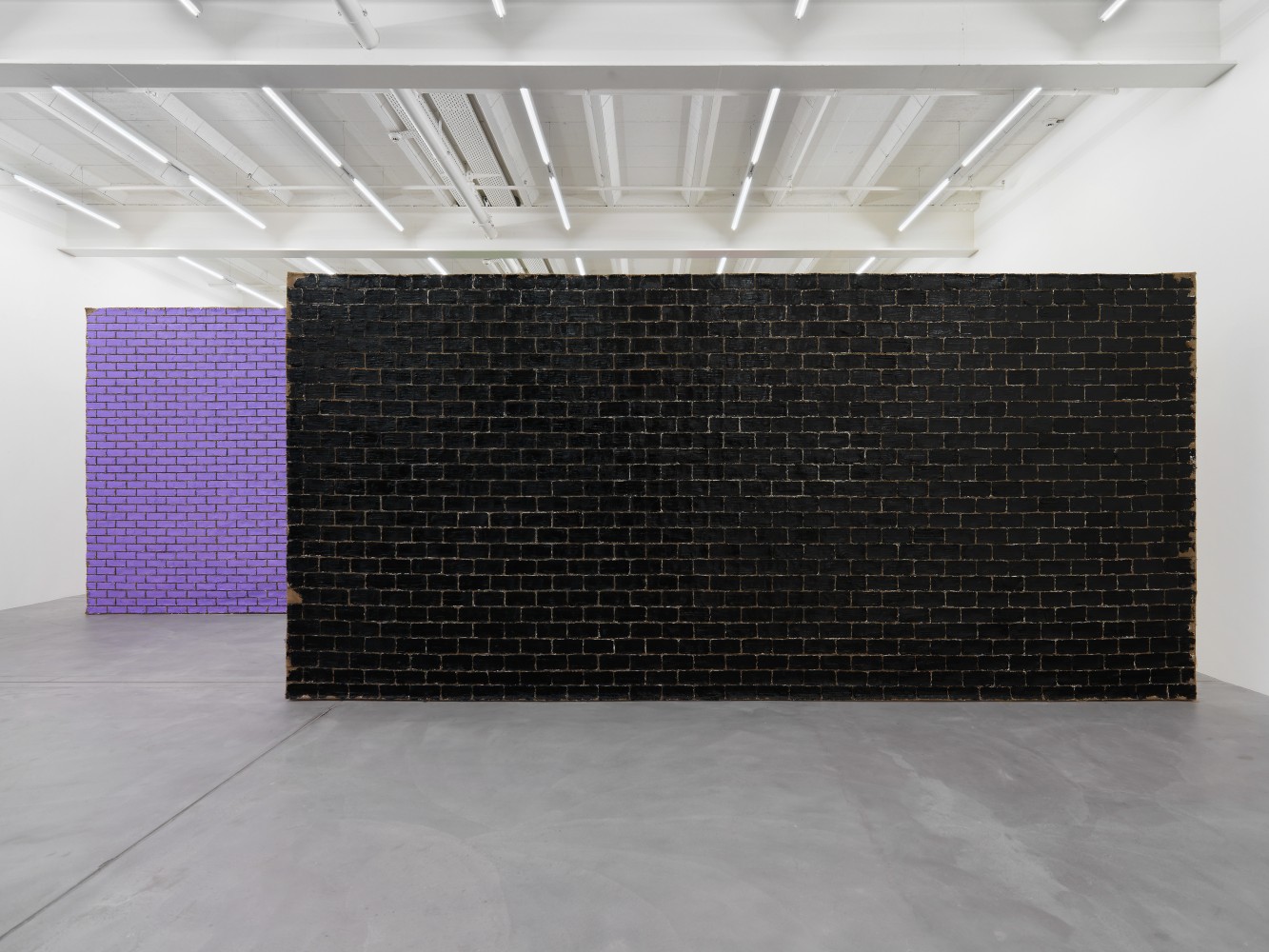 Installation view of Ugo Rondinone brick wall paintings exhibition