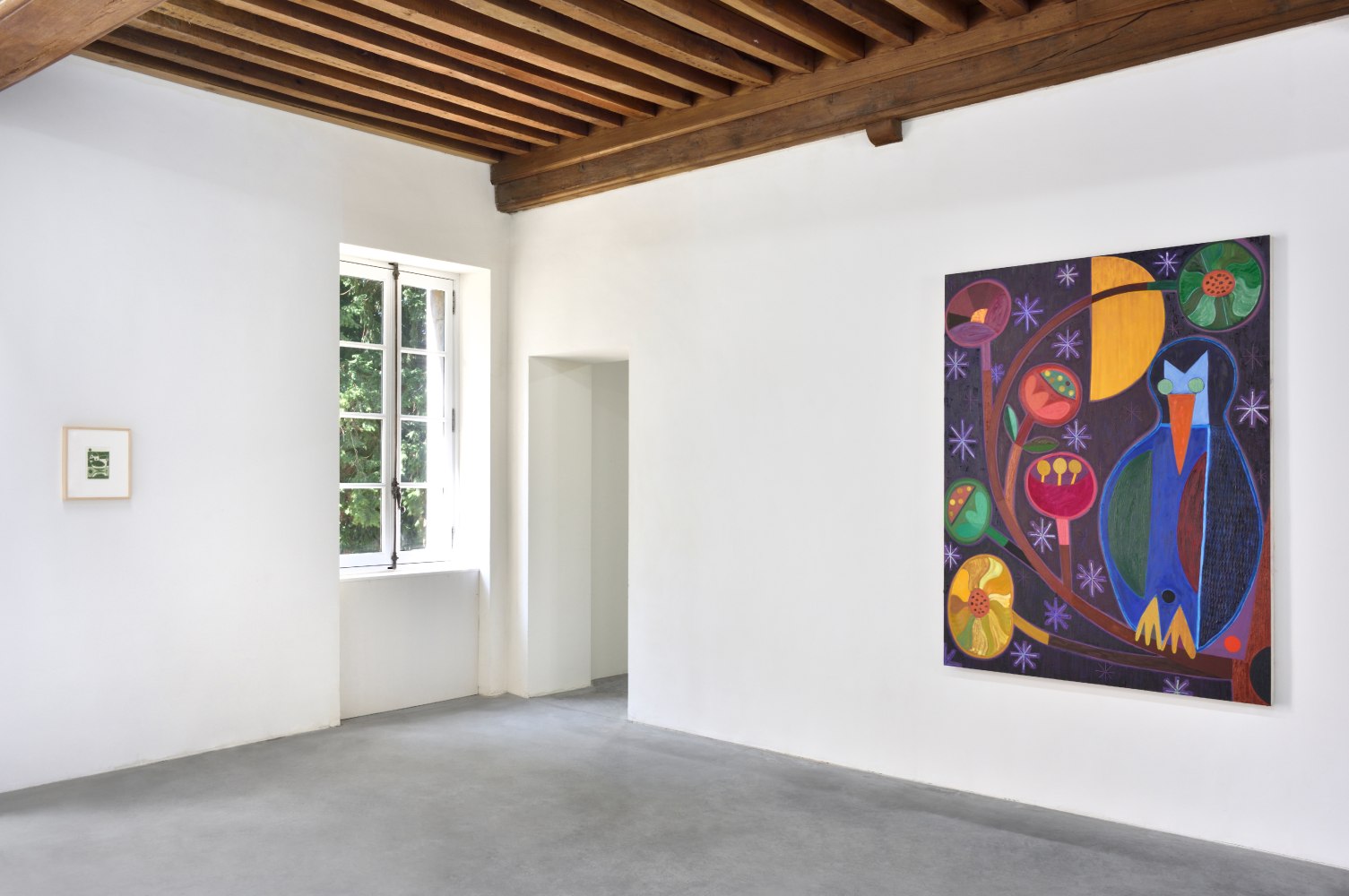 Installation view of paintings and sculptures by Austin Eddy