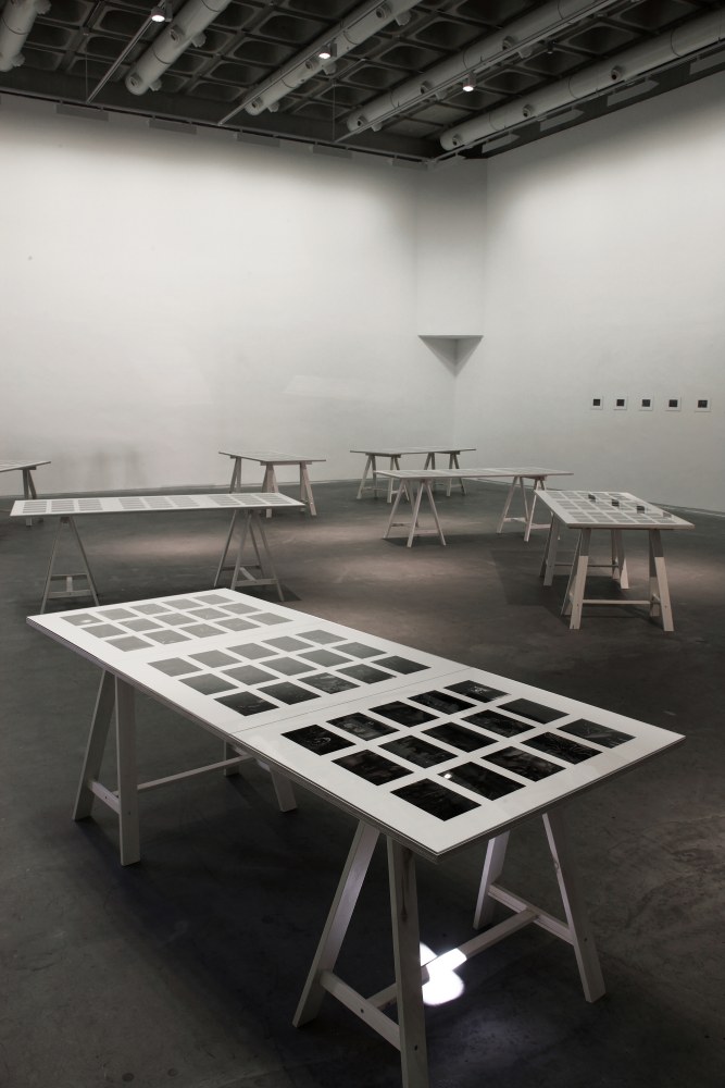 Installation view of photographs by Peter Fischli and David Weiss