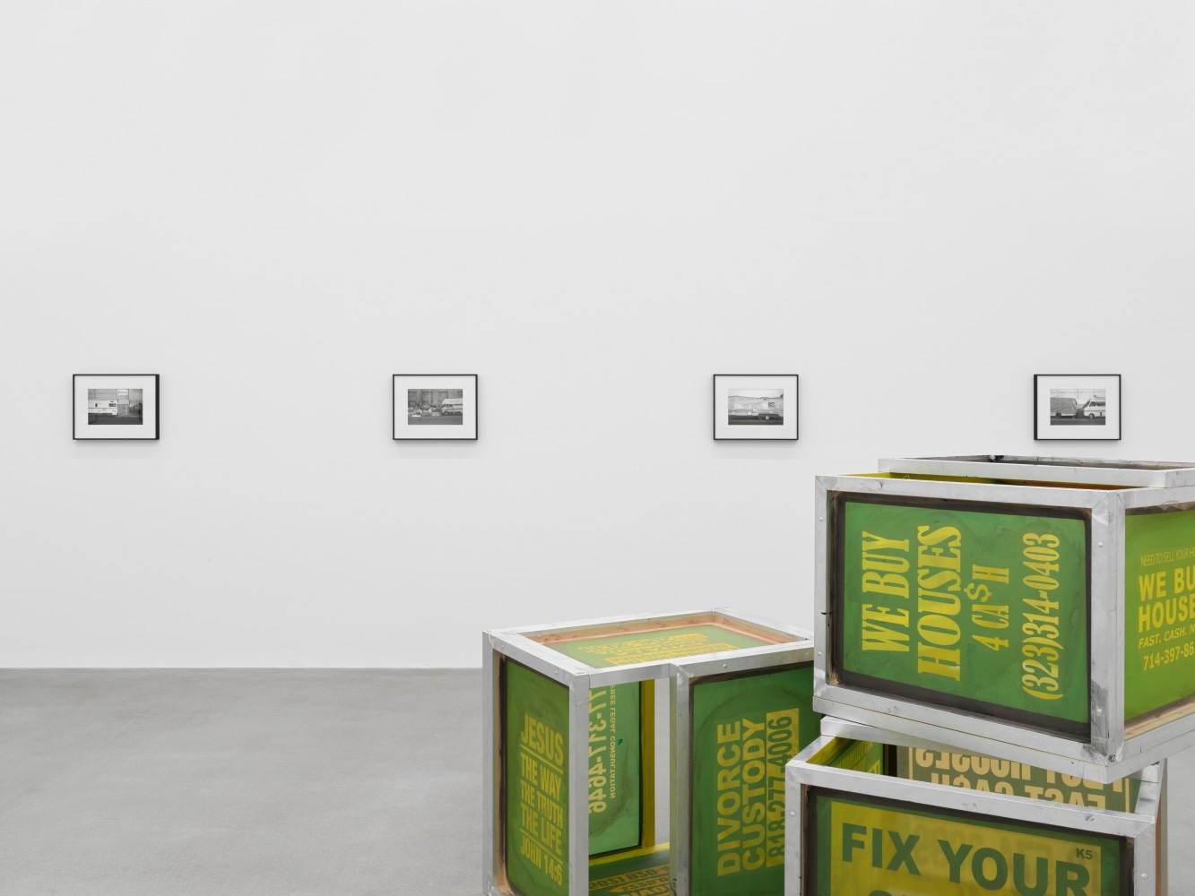 Installation view of Walead Beshty collage, photography, and sculpture exhibition