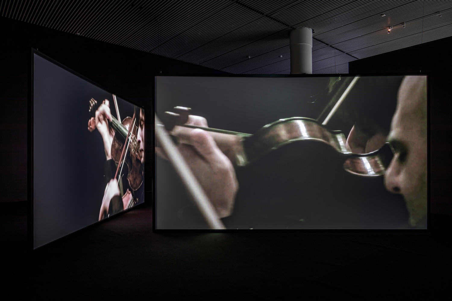 Installation view of video work by Douglas Gordon