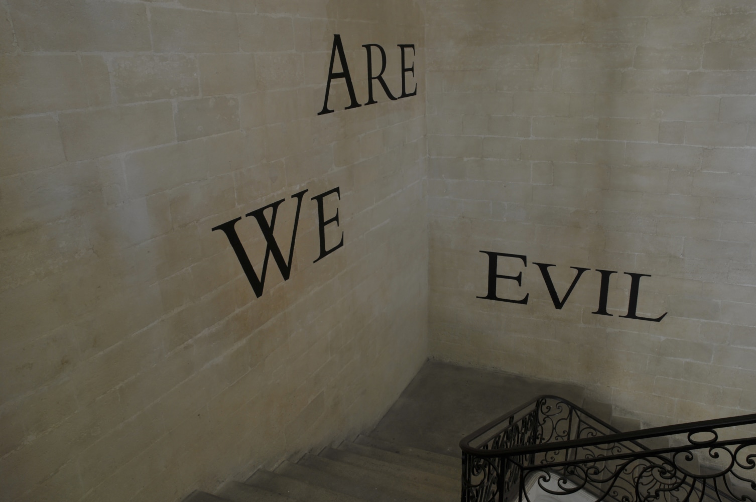 Installation view of wall quote by Douglas Gordon