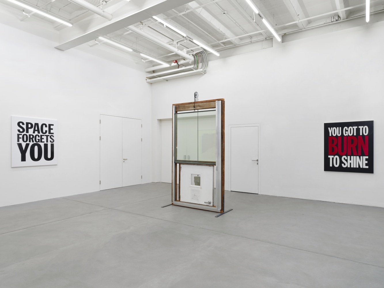 Installation view of group painting and sculpture exhibition