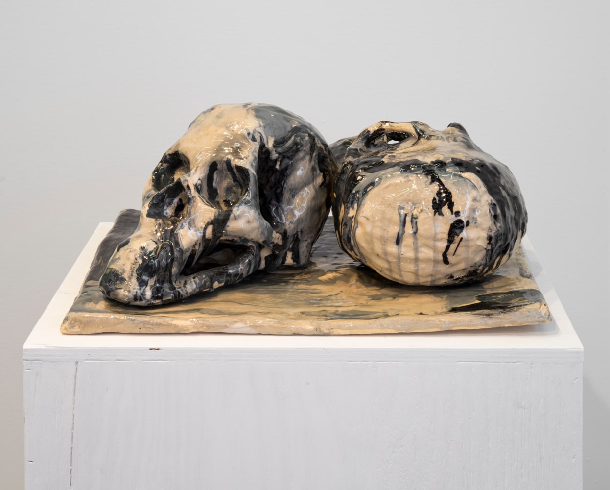 ANDREW&amp;nbsp;LORD
two modeled skulls and base, the Bowery, August, 7 pm. (II)
2007
Ceramic and silver leaf; 2-parts
19 x 43.5 x 34 cm / 7 1/2 x 17 1/8 x 13 3/8 inches
Pedestal&amp;nbsp; 49.5 x 39 x 96.5 cm / 19 1/2 x 15 1/4 x 38 inches