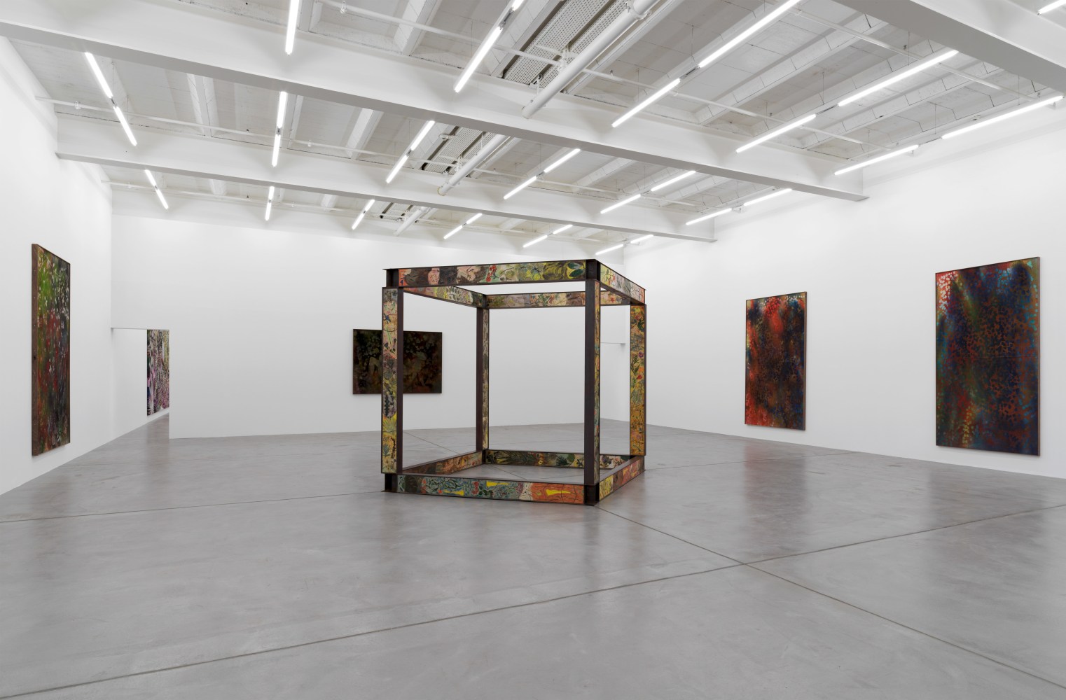 Installation view of Sam Falls paintings and sculptures exhibition