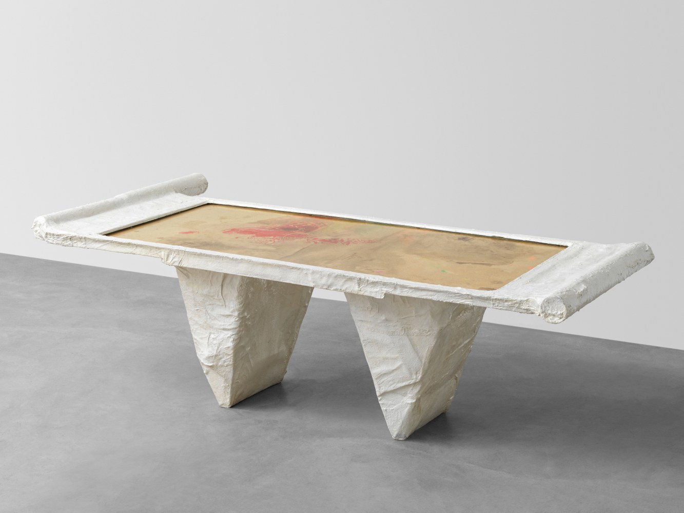 Tisch

1983

Wood, glass, gaze, plaster

86 x 144 x 270 cm / 33 7/8 x 56 3/4 x 106 1/4 in

&amp;copy; Archiv Franz West &amp;copy; Estate Franz West

&amp;nbsp;