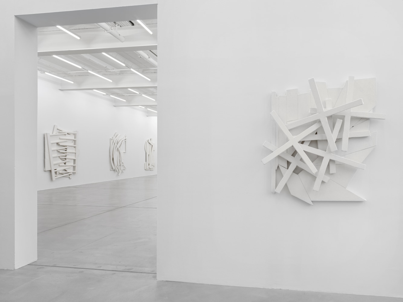 Installation view of Wyatt Kahn wall reliefs