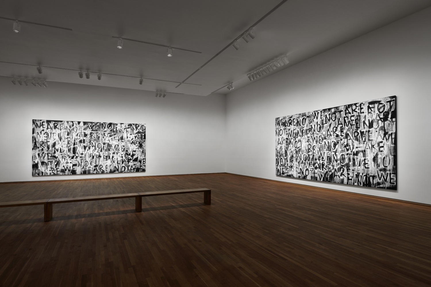 Installation view of black and white paintings by Adam Pendleton